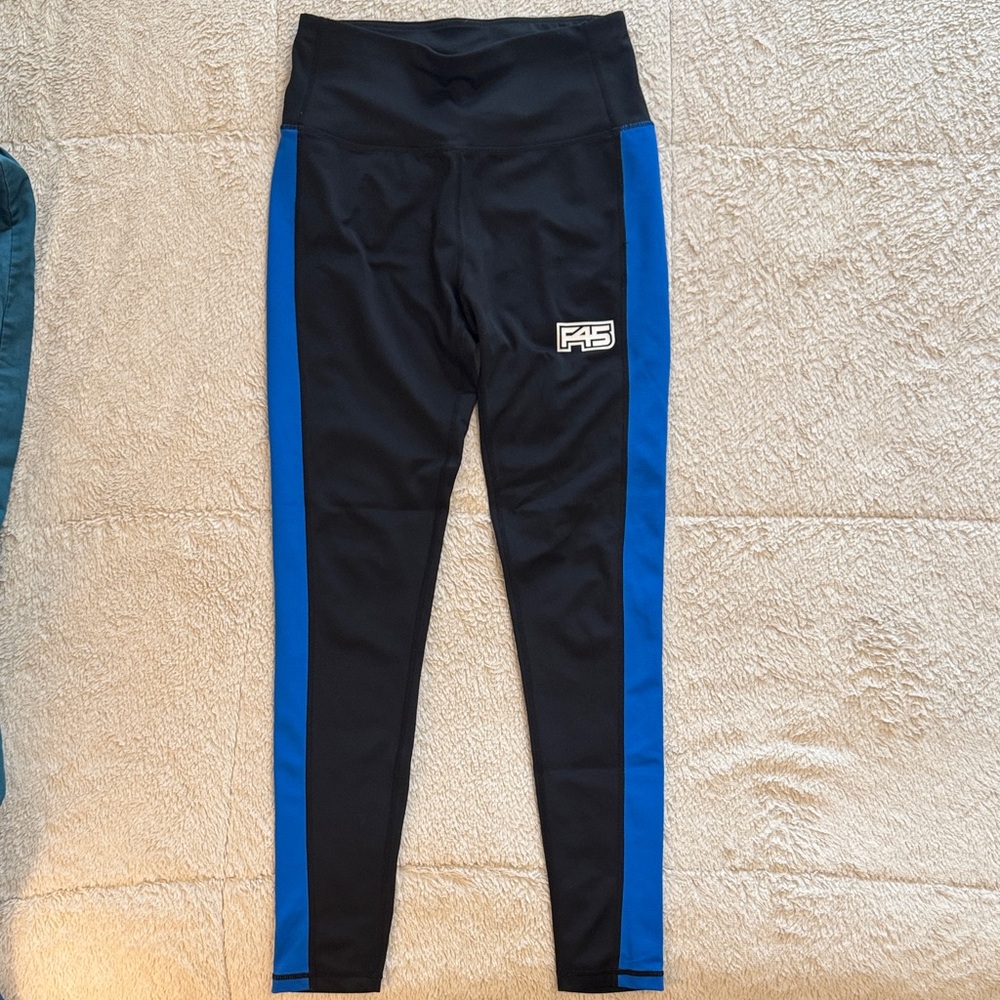F45 Coach Women's Black Leggings with Blue Side Stripe